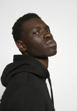 YOURTURNUNISEX - Luvtröja - Black -YOURTURN Affär ac1fd866015d465fbbcc5c5001148d53